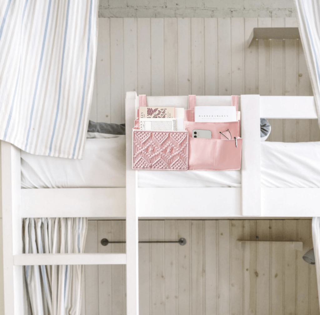Bedside caddy — phone, glasses, notebook at arm’s length.